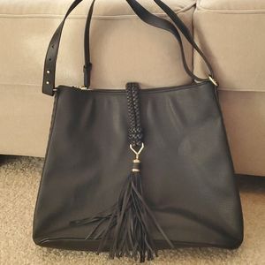 Stella & Dot black faux leather hobo bag w/tassel